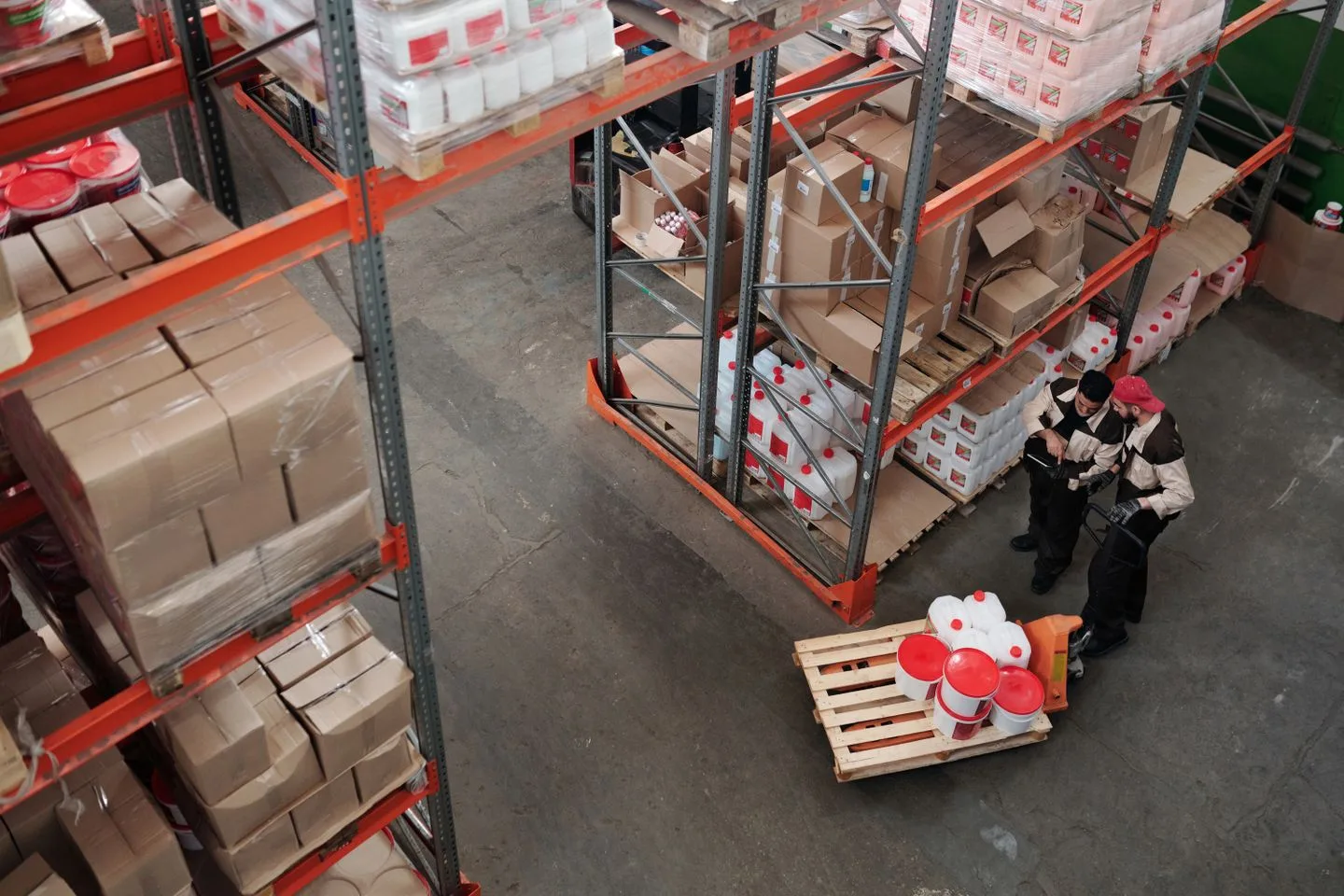 Distribution team reviewing warehouse inventory